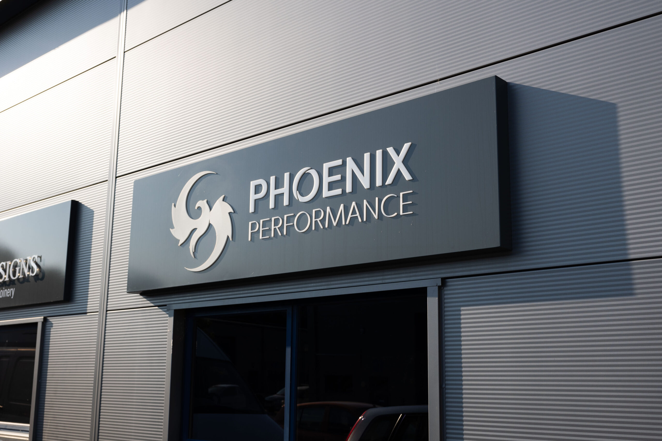 Phoenix Performance Gym entrance door and sign