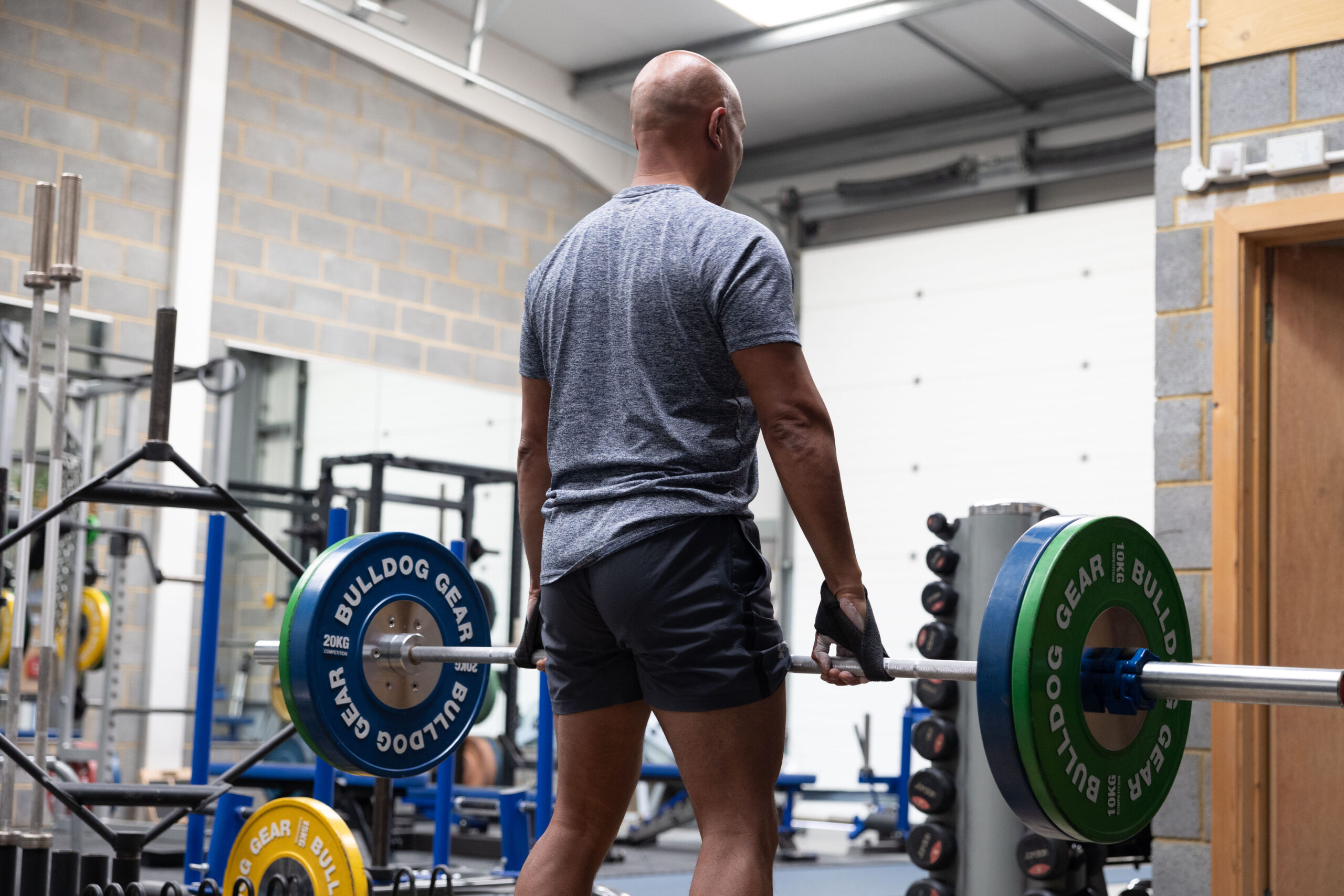 Phoenix Gym man lifting weights