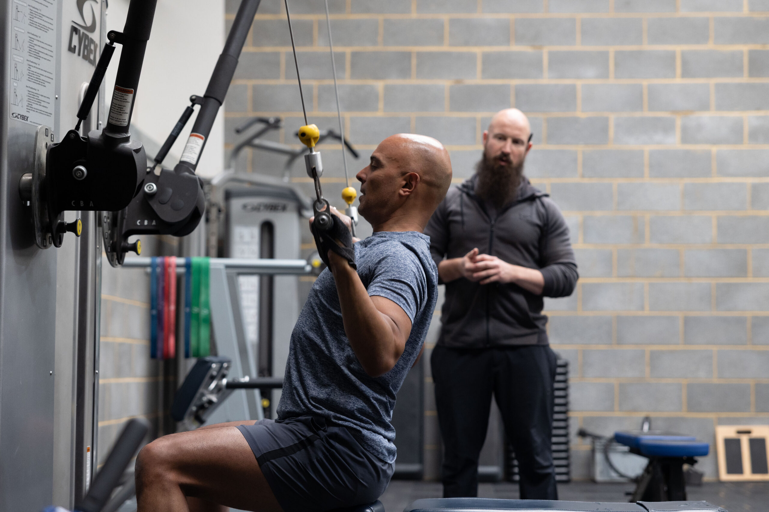 Man using weight machine