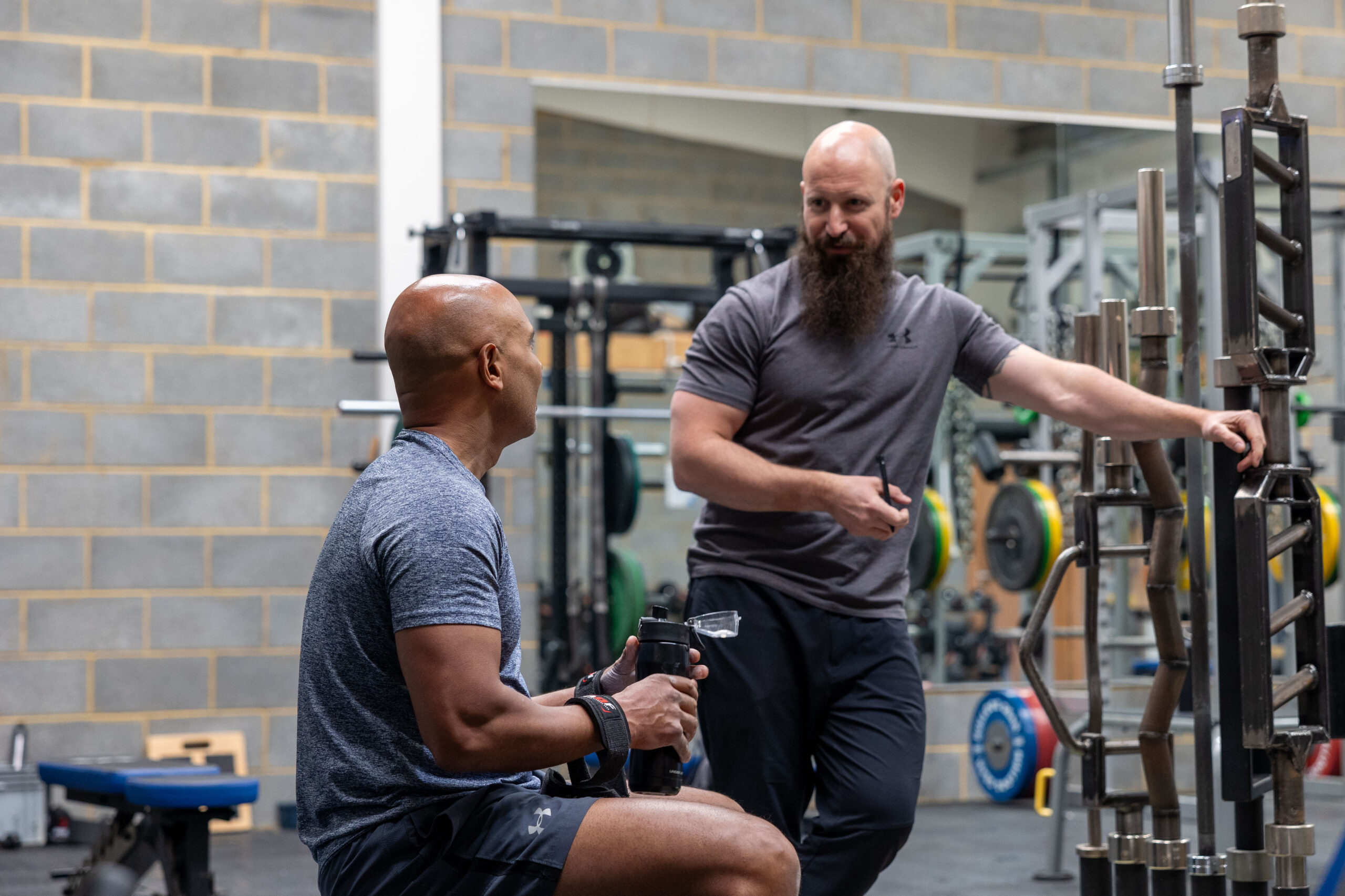 Phoenix Gym Personal Training Session man talking to client