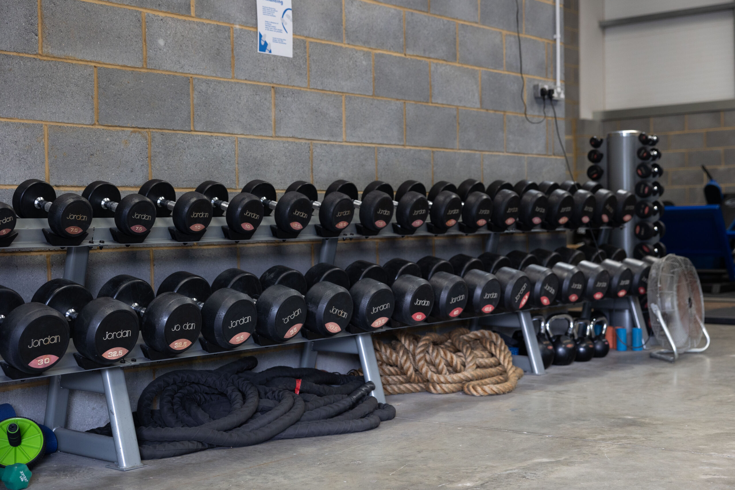 Phoenix Gym weights and accessories rack