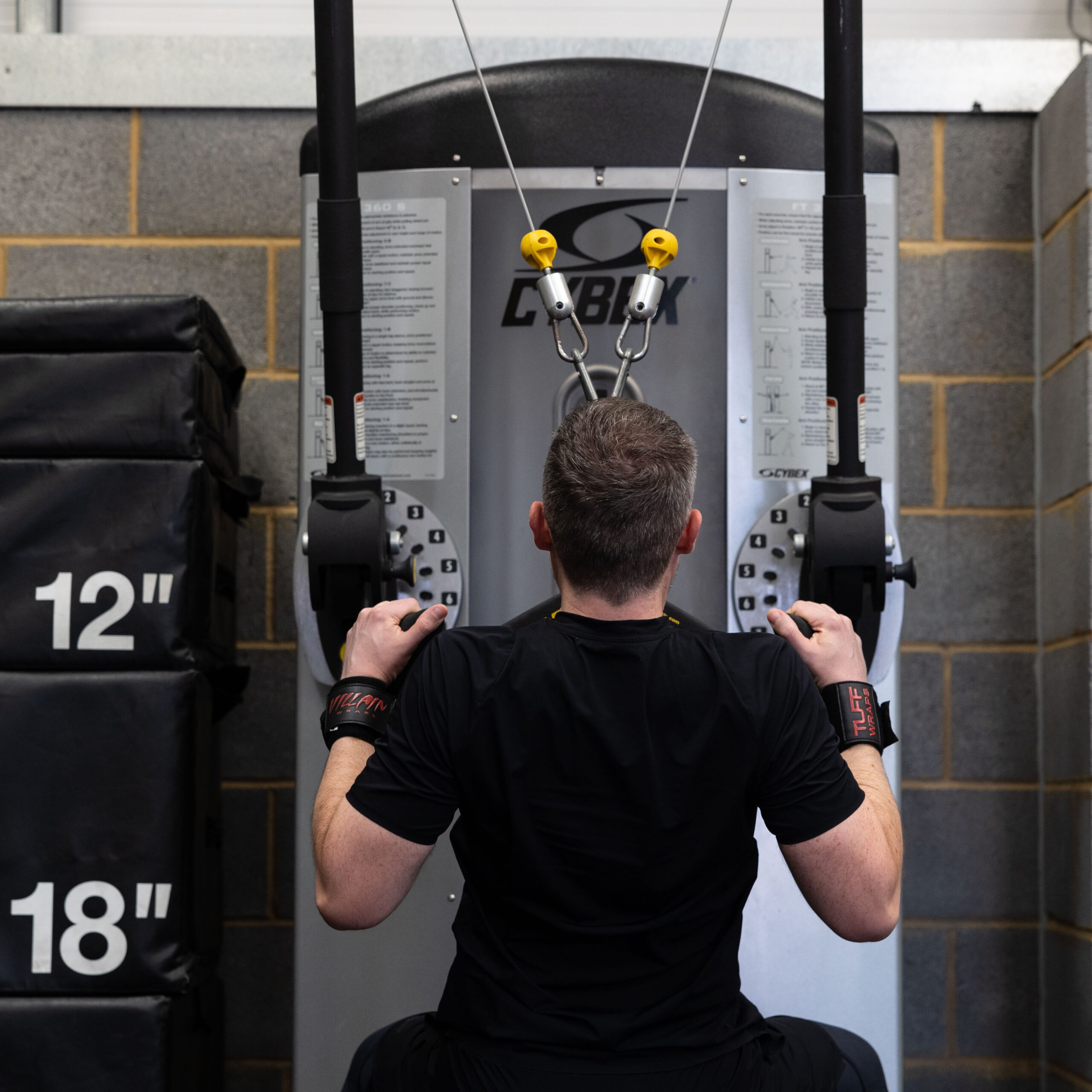 Man using weight machine
